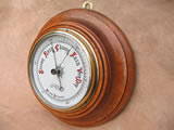 Late 19th century turned Oak aneroid barometer with ceramic dial